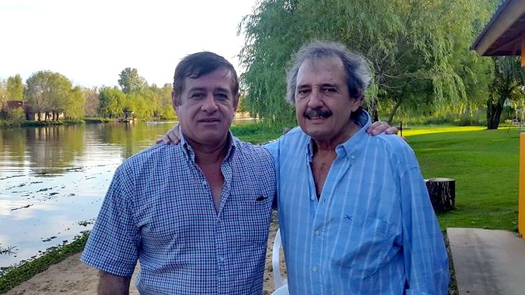 Jorge Landra (izq) junto a Ricardo Alfonsín (der)